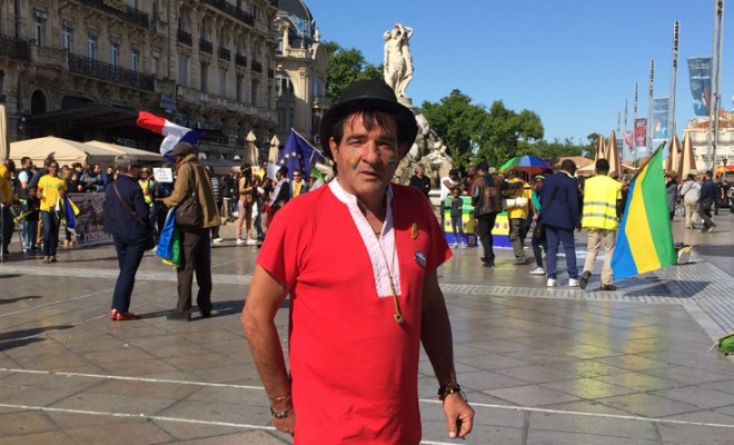 Alexandre Humans, sur la place de le Comédie, lors d'une manifestation de la diaspora gabonaise. C.P : F.A